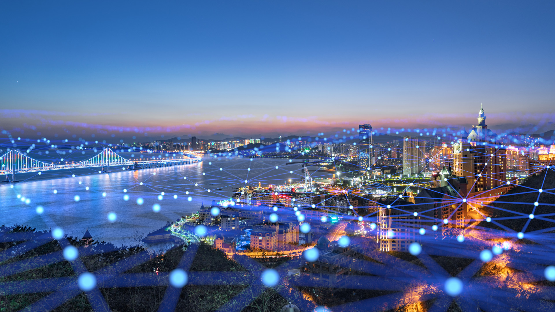 Symbolische Darstellung eines LoRaWAN-Netzes über einer Stadt